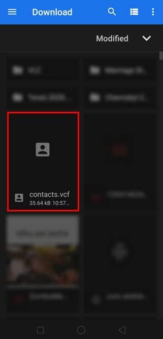 Vaya a la sección Descargas y seleccione el archivo contactos.vcf.